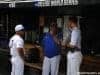 University of Florida manager Kevin O’Sullivan meets with volunteer assistant Lars Davis and assistant coach Craig Bell before the Florida Gators game against TCU- Florida Gators baseball- 1280x850