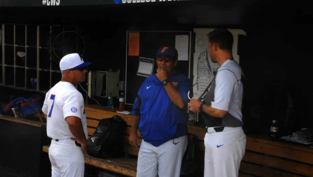 University of Florida manager Kevin O’Sullivan meets with volunteer assistant Lars Davis and assistant coach Craig Bell before the Florida Gators game against TCU- Florida Gators baseball- 1280x850