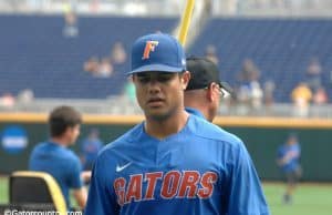 University of Florida outfielder Nelson Maldonado walks off the field after practice at TD Ameritrade Park for the College World Series- Florida Gators baseball- 1280x850