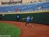 University of Florida outfielder/pitcher Nick Horvath throws a ball into the infield during practice in Omaha- Florida Gators baseball- 1280x850