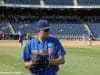 University of Florida pitcher Garrett Milchin warms up before the Florida Gators CWS game against the Louisville Cardinals- Florida Gators baseball- 1280x850