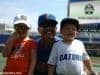 University of Florida head coach Kevin O’Sullivan poses with his kids, Payton and Finn, in Omaha at the College World Series- Florida Gators baseball- 1280x850