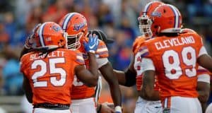 University of Florida running back Jordan Scarlett celebrates with C’yontai Lewis after scoring a touchdown in the 2017 Orange and Blue Debut- Florida Gators football- 1280x852