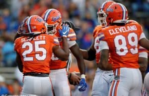 University of Florida running back Jordan Scarlett celebrates with C’yontai Lewis after scoring a touchdown in the 2017 Orange and Blue Debut- Florida Gators football- 1280x852