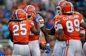 University of Florida running back Jordan Scarlett celebrates with C’yontai Lewis after scoring a touchdown in the 2017 Orange and Blue Debut- Florida Gators football- 1280x852