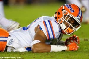University of Florida defensive back Jeawon Taylor on the ground at Doak Campbell Stadium after injuring his shoulder against FSU- Florida Gators football- 1280x852