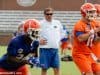 University of Florida head coach Jim McElwain watches as Jake Allen goes through a rep during 2017 fall camp- Florida Gators football- 1280x852