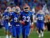 University of Florida linebacker David Reese runs onto Florida Field before the Gators game against Michigan- Florida Gators football- 1280x852