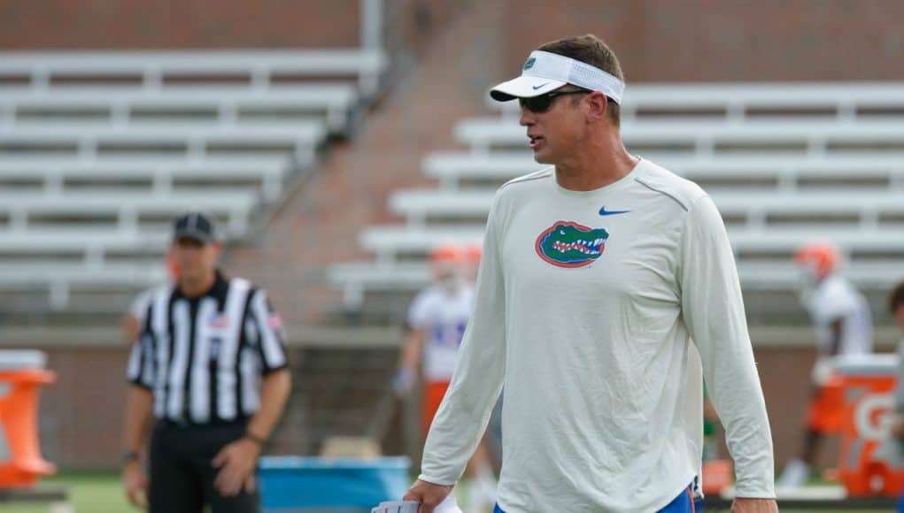 University of Florida offensive coordinator Doug Nussmeier working with the quarterbacks during fall camp- Florida Gators football- 1280x852