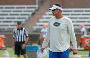 University of Florida offensive coordinator Doug Nussmeier working with the quarterbacks during fall camp- Florida Gators football- 1280x852