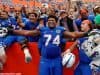 University of Florida offensive lineman Fred Johnson celebrates with his teammates and fans after the Florida Gators win over South Carolina in 2016- Florida Gators football- 1280x852
