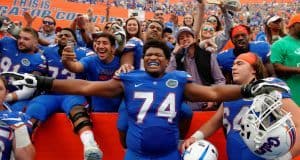 University of Florida offensive lineman Fred Johnson celebrates with his teammates and fans after the Florida Gators win over South Carolina in 2016- Florida Gators football- 1280x852