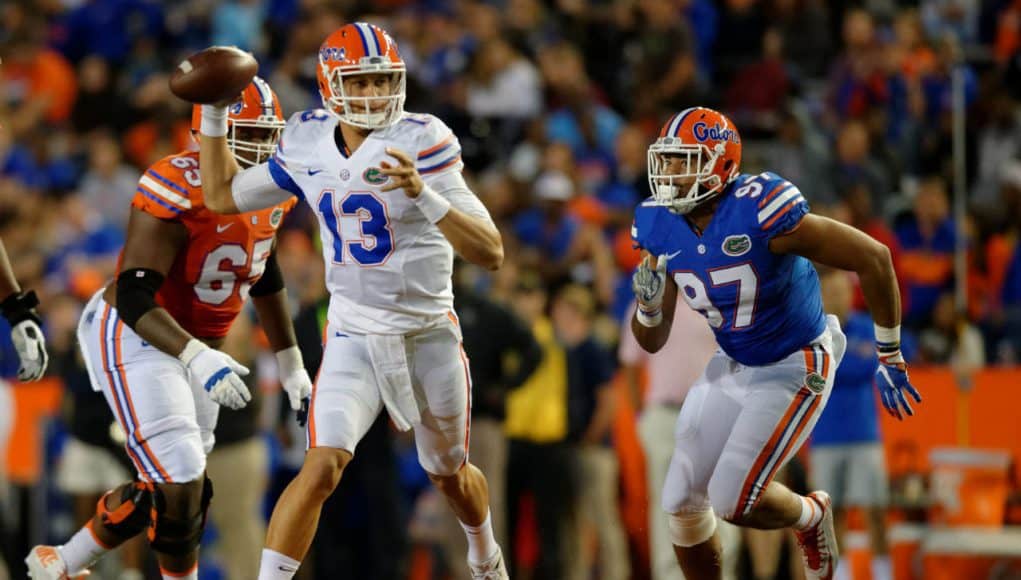 University of Florida quarterback Feleipe Franks scrambles and throws a pass during the Orange and Blue Debut- Florida Gators football- 1280x852