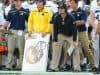 University of Michigan head football coach Jim Harbaugh watches his team beat Florida in the 2016 Buffalo Wild Wings Bowl- Florida Gators football- 1280x852