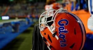 A Florida Gators helmet rests on a fence during the 2017 Orange and Blue Debut- Florida Gators football- 1280x852