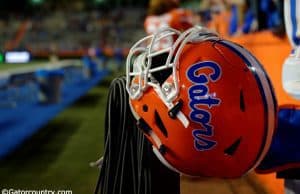 A Florida Gators helmet rests on a fence during the 2017 Orange and Blue Debut- Florida Gators football- 1280x852