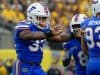 Florida Gators linebacker David Reese makes a tackle against Michigan-1280x853