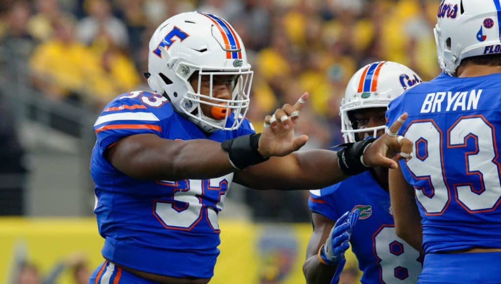 Florida Gators linebacker David Reese makes a tackle against Michigan-1280x853