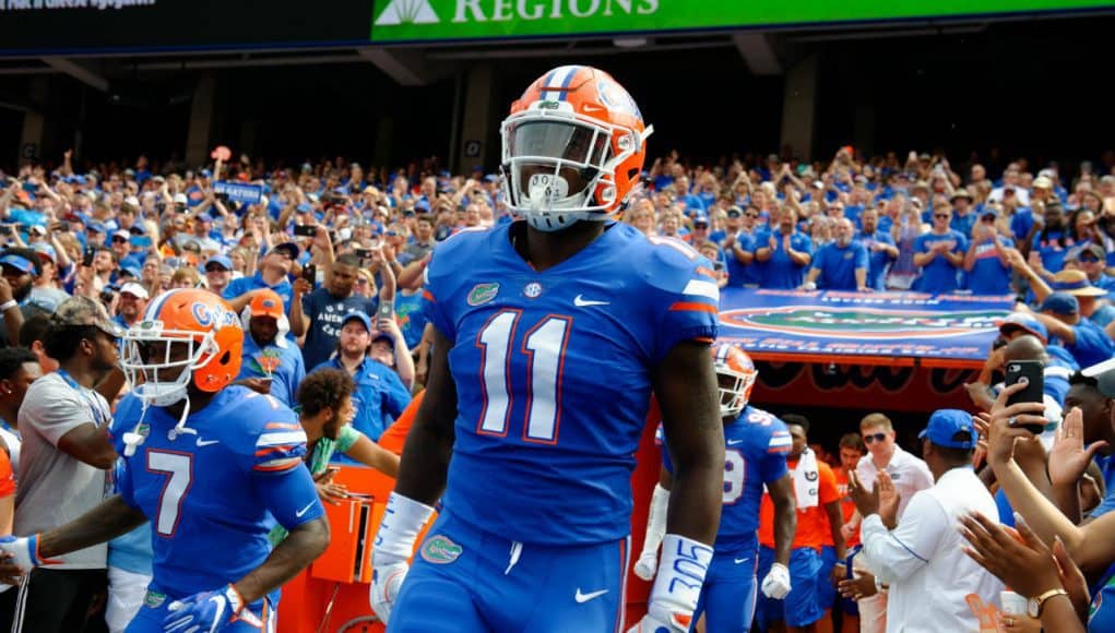 Florida Gators linebacker Vosean Joseph runs out of the tunnel- 1280x852