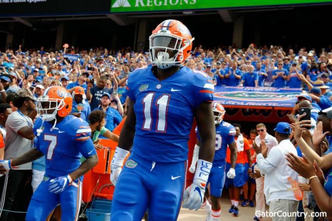 Florida Gators linebacker Vosean Joseph runs out of the tunnel- 1280x852