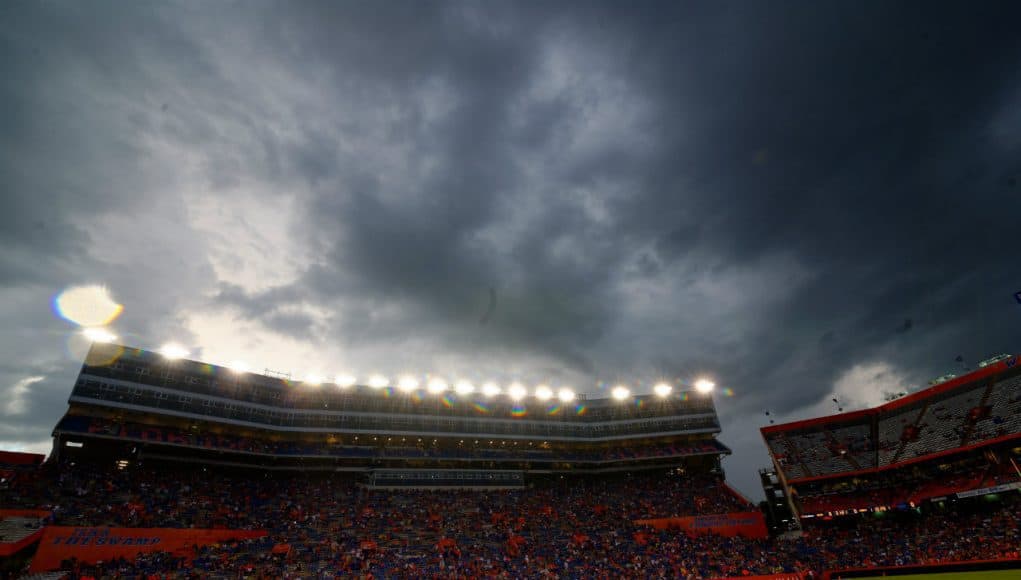 Rain clouds move over Ben Hill Griffin Stadium and eventually force a rainout of the Florida Gators game against the Idaho Vandals in 2014- Florida Gators football- 1280x852