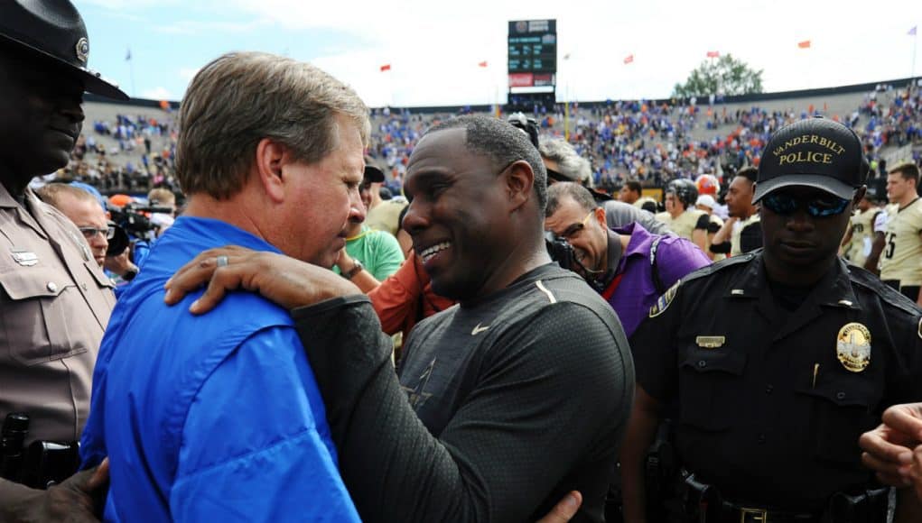 Oct 1, 2016; Nashville, TN, USA; Florida Gators head coach Jim McElwain and Vanderbilt Commodores head coach Derek Mason after a Florida win at Vanderbilt Stadium. Florida won 13-6. Mandatory Credit: Christopher Hanewinckel-USA TODAY Sports