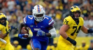 University of Florida defensive back Duke Dawson returns an interception 48-yards for a touchdown against Michigan- Florida Gators football- 1280x852
