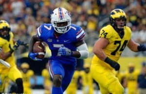 University of Florida defensive back Duke Dawson returns an interception 48-yards for a touchdown against Michigan- Florida Gators football- 1280x852