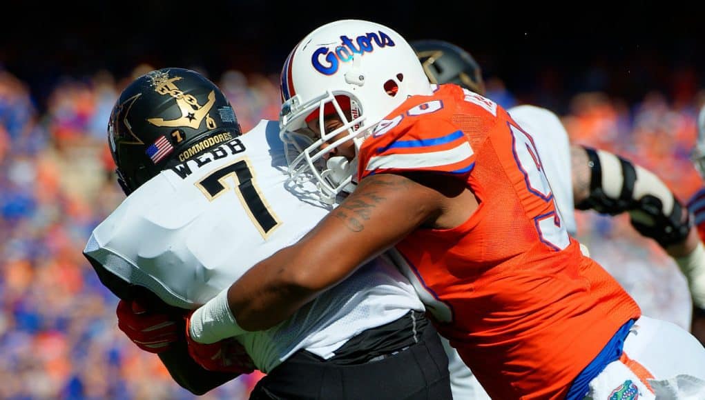 University of Florida defensive lineman Jon Bullard tackles Vanderbilt running back Ralph Webb in a win over Vanderbilt- Florida Gators football- 1280x851