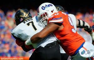 University of Florida defensive lineman Jon Bullard tackles Vanderbilt running back Ralph Webb in a win over Vanderbilt- Florida Gators football- 1280x851