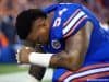 University of Florida defensive tackle Khairi Clark prays before the Florida Gators season opener against UMass in 2016- Florida Gators football- 1280x854