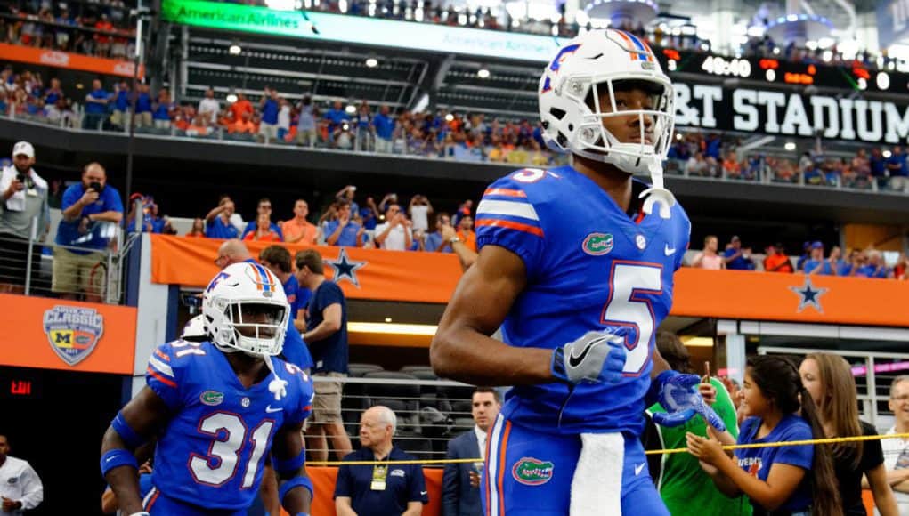 University of Florida freshmen C.J. Henderson and Shawn Davis run out on to the field before the Florida Gators game against Michigan- Florida Gators football- 1280x852