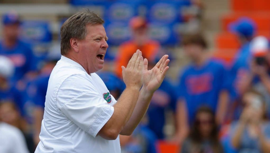 University of Florida head coach Jim McElwain cheers on his team as they warm up for their game against the Tennessee Volunteers- Florida Gators football- 1820x852