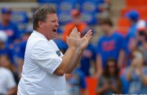 University of Florida head coach Jim McElwain cheers on his team as they warm up for their game against the Tennessee Volunteers- Florida Gators football- 1820x852