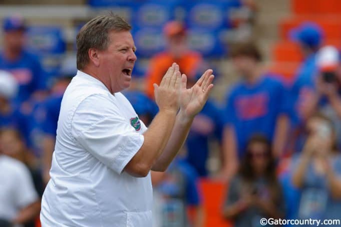University of Florida head coach Jim McElwain cheers on his team as they warm up for their game against the Tennessee Volunteers- Florida Gators football- 1820x852
