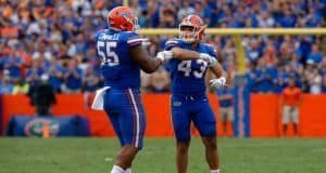 University of Florida linebacker Cristian Garcia and defensive lineman Kyree Campbell celebrate after a tackle against Tennessee- Florida Gators football- 1280x852
