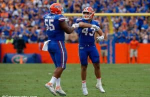 University of Florida linebacker Cristian Garcia and defensive lineman Kyree Campbell celebrate after a tackle against Tennessee- Florida Gators football- 1280x852