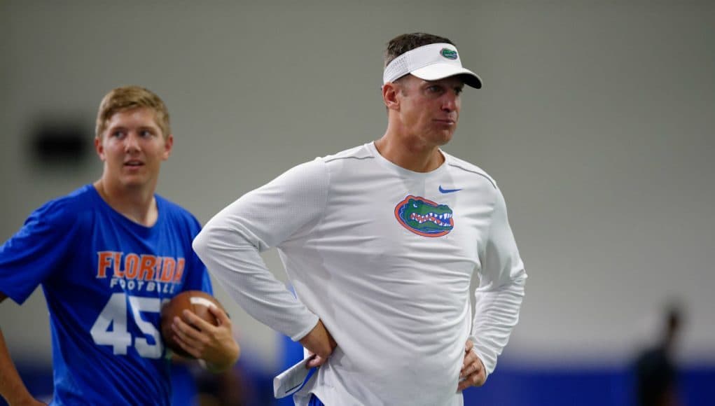 University of Florida offensive coordinator Doug Nussmeier watches as players go through drills during Friday Night Lights- Florida Gators football- 1280x852