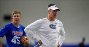 University of Florida offensive coordinator Doug Nussmeier watches as players go through drills during Friday Night Lights- Florida Gators football- 1280x852