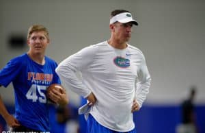 University of Florida offensive coordinator Doug Nussmeier watches as players go through drills during Friday Night Lights- Florida Gators football- 1280x852