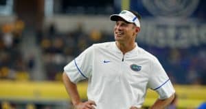 University of Florida offensive coordinator Doug Nussmeier watches the Florida Gators warm up prior to their game vs Michigan- Florida Gators football- 1280x852