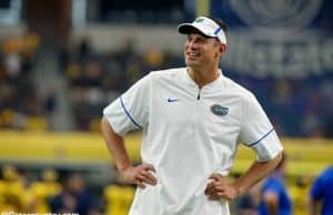 University of Florida offensive coordinator Doug Nussmeier watches the Florida Gators warm up prior to their game vs Michigan- Florida Gators football- 1280x852