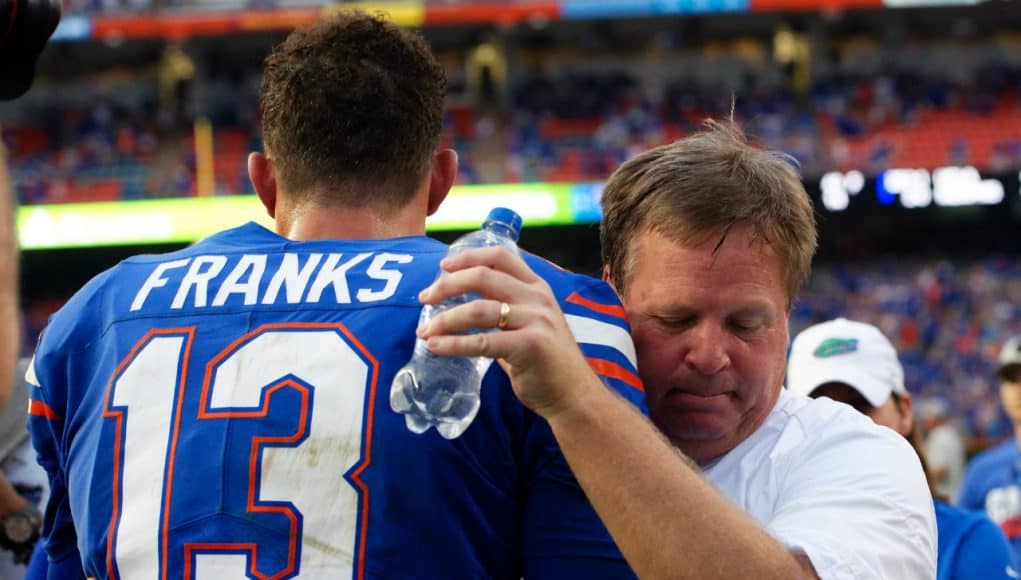 University of Florida quarterback Feleipe Franks and Jim McElwain embrace after the Florida Gators 26-20 win over Tennessee- Florida Gators football- 1280x852