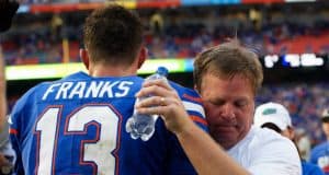 University of Florida quarterback Feleipe Franks and Jim McElwain embrace after the Florida Gators 26-20 win over Tennessee- Florida Gators football- 1280x852