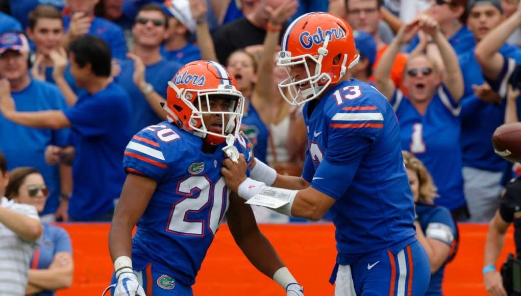 University of Florida quarterback Feleipe Franks tries to calm down Malik Davis after Davis fumbled on the goal line- Florida Gators football- 1280x852