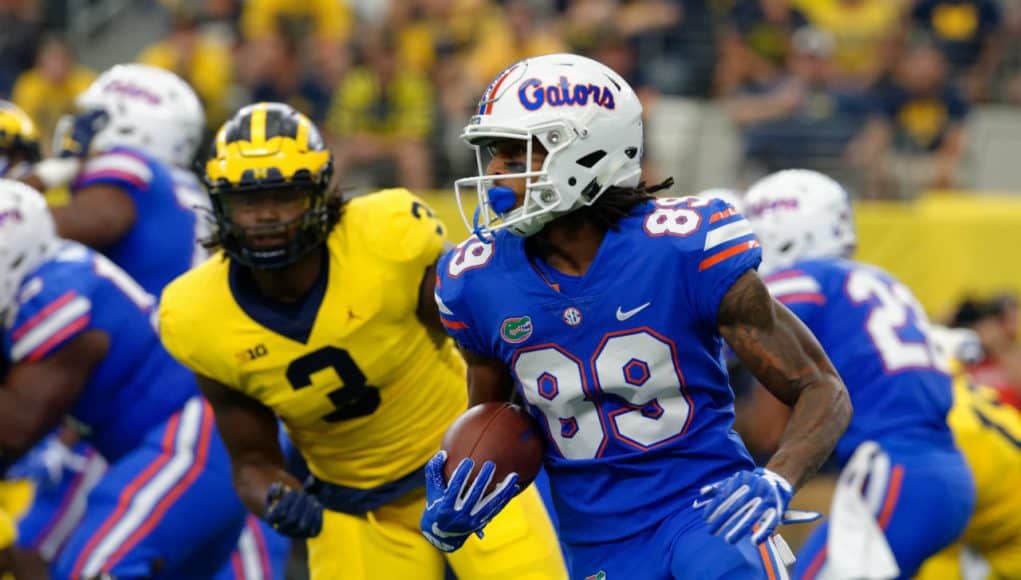 University of Florida receiver Tyrie Cleveland runs after a reception while Michigan’s Rashan Gary chases- Florida Gators football- 1280x852