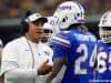 University of Florida running backs coach Ja’Juan Seider talks with running back Mark Thompson during the Florida Gators game against Michigan- Florida Gators football- 1280x852