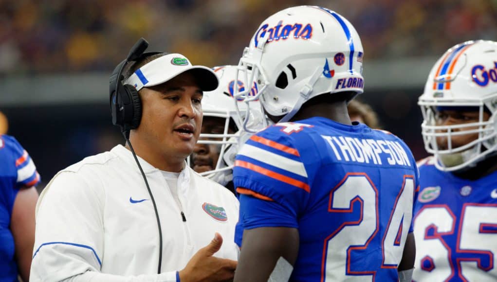 University of Florida running backs coach Ja’Juan Seider talks with running back Mark Thompson during the Florida Gators game against Michigan- Florida Gators football- 1280x852