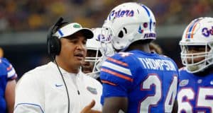 University of Florida running backs coach Ja’Juan Seider talks with running back Mark Thompson during the Florida Gators game against Michigan- Florida Gators football- 1280x852