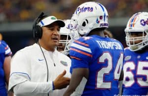 University of Florida running backs coach Ja’Juan Seider talks with running back Mark Thompson during the Florida Gators game against Michigan- Florida Gators football- 1280x852